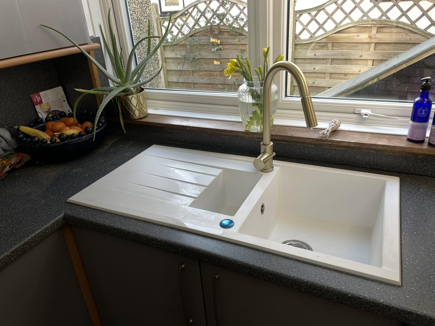 Gold tap with cream sink