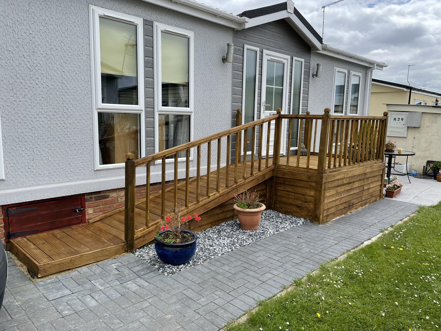 Wooden deck installed outside static caravan